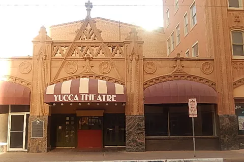 The ornate marquee and facade of the Yucca Theatre in downtown Midland, Texas
